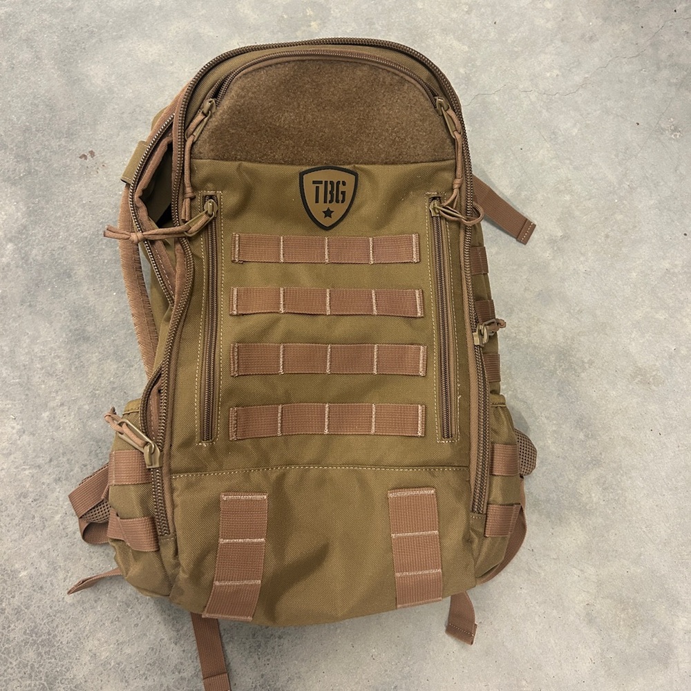 Tactical Baby Gear backpack with cupholders in coyote brown